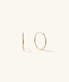 As basic as your white tee (seriously)! Handcrafted in hollowed 14k solid gold, these are our lightest hoops ever. Wear them all day, everyday - even while swimming, just remember to take them off before sleeping. Piercing Studio, Hoop Charms, Virtual Fashion, Sell Gold, Gold Piece, Green Agate, Engraved Items, Recycled Gold, Accessories Jewelry Earrings