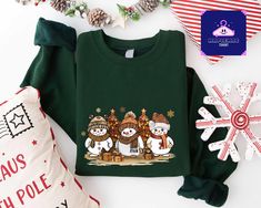 Christmas Snowman Sweatshirt,Winter Holiday Sweater,Snowman Tee,Snowman T-Shirt,Christmas Crewneck,Christmas Gift,Christmas Shirts for Women ----- How To Order ----- 1-) Please, check and review all the photos. 2-) Choose your t-shirt size and color. *Different styles of shirts may have different shades of same color choice due to different manufacturer brands. *For this reason, we recommend you to match shirts from the same styles if you want precisely matching colors (ex. Unisex, V-necks, Toddler, etc.). 3-) Click add to cart. You can go back to add more shirts. 4-)Click "Proceed to check out". 5-)When you check out, you can add a note to seller for any request. SIZING We are using Unisex sizing sweatshirts for a casual and relaxed fit. That means they run slightly larger than typical wo Snowman Sweatshirt, Sweater Snowman, Snowman Sweater, Snow Falls, Winter Top, Christmas Crewneck, Matching Colors, Holiday Sweatshirt, Christmas Gifts For Friends