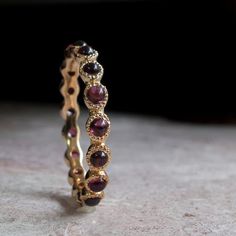 The most perfect garnet band EVER!..b Eternity Ring Set, Gold Eternity Ring, Eternity Ring Gold, Red Ring, Garnet And Gold, Handmade Fine Jewelry, Jewelry Lookbook, Chatelaine, Pretty Rings