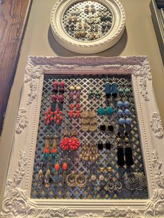 there are many different earrings on display in the frame, but no one is wearing them