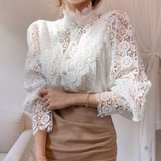 Marleigh Blouse Material: CottonMaterial: Polyester Size Length Bust Sleeve Shoulder UNIT CM INCH CM INCH CM INCH CM INCH S 61 24.03 86 33.88 55 21.67 39 15.37 M 61.5 24.23 90 35.46 56 22.06 40 15.76 L 62 24.43 94 37.04 57 22.46 41 16.15 XL 62.5 24.63 98 38.61 58 22.85 42 16.55 2XL 63 24.82 102 40.19 59 23.25 43 16.94 3XL 63.5 25.02 106 41.76 60 23.64 44 17.34 Note: 1.Measure error within 2-4cm is normal 2.It is usually smaller than Europe's size, please check the above-detailed measurement to c Vintage Lace Blouses, Stand Collar Blouse, Women Lace Blouse, Stand Collar Shirt, Patchwork Shirt, Estilo Hippie, Floral Lace Tops, Petal Sleeve, Vintage Mode