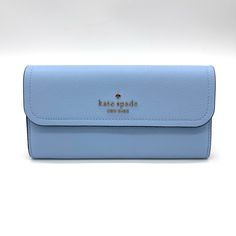 Brand New With Tag Kate Spade Rosie Large Flap Wallet Measurements 7.8" W X 4" H Color: Celeste Blue Features Metal Pinmount With Spade Logo Dust Bag Included: No Materials Pebbled Leather Lining: Two Way Spade Jacquard Lining Imported Formal Blue Bags With Card Slots, Elegant Blue Wallets With Interior Card Slots, Light Blue Rectangular Travel Wallet, Chic Blue Rectangular Wallet, Light Blue Rectangular Bag With Card Slots, Light Blue Rectangular Bags With Card Slots, Everyday Blue Wallet With Cell Phone Pocket, Classic Blue Travel Clutch, Classic Blue Clutch For Travel