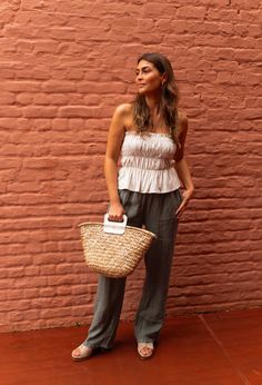 Crafted from linen to be flowy and comfortable, these lovely pants feature two side pockets for functionality and elastic at the waist for a perfect fit. Designed to be both lounged in and lived in. Though unlined, the pants are not sheer. Our model also wears the Jude top One size (fits from US 2-4-6-8) Length 41.34 in - Width 12.99 in 100% linen Washing: handwash only Chic Harem Pants For Vacation, Chic Beach Harem Trousers, Chic Linen Wide Leg Pants For Day Out, Chic Relaxed Fit Harem Pants For Beach, Casual Linen Harem Pants For Vacation, Chic Ankle-length Harem Pants For Vacation, Chic Ankle-length Harem Pants For Beach, Chic Flax Bottoms For Loungewear, Chic Flax-colored Loungewear Bottoms