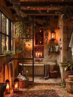 a bath room with a tub a window and candles