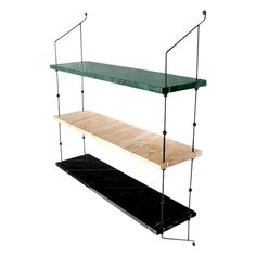 three tiered shelving unit with metal handles