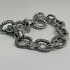 David Yurman Oval Link Chain Bracelet Sterling Silver, 12mm Includes Dy Box And Pouch Length: 6.75” Lobster Clasp In Great Condition Classic Bracelets With Chunky Oval Link Chain, Classic Oval Metal Chain Bracelet, Elegant Sterling Silver Bracelet With Chunky Chain, Elegant Sterling Silver Chunky Chain Bracelet, Classic Sterling Silver Bracelet With Chunky Chain, Elegant Sterling Silver Chunky Link Bracelet, Classic Sterling Silver Bracelet With Chunky Oval Links, Elegant Oval Bracelet With Chunky Chain, Elegant Oval Chain Bracelet With Chunky Chain