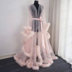 This Is An Elegant, Sexy And Luxurious Sheer Robe With A Feather/Fur Trim And A Gorgeous Satin Tie. This Sheer Gorgeous Gown/Robe Is Perfect For Boudoir And Romantic Moments. You Can Use This Sheer Feather Peignoir With Beautiful Marabou Boas For You Wedding Day, Dancing, Photoshoot Or Romantic Evenings. High Quality Tulle And Marabou Feathers With A Satin Ribbon At The Waist. Perfect For Use As Lingerie Or As A Bridal Robe. Color: Light Pink Size: S/M Runs Large ... This Was Custom Fit For A 5' Feather Bridal Robe, Polka Dot Wedding Dress, Unique Boho Wedding Dress, Fancy Robes, Pijama Satin, Simple Wedding Dress Beach, Bridal Fur, Wedding Scarf, Sheer Robe