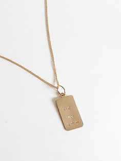 This cute smaller square dog tag is such a cute classic and dainty addition to your stack! All components 14k gold filled If you’d like initials or a one big letter stamped into your dog tag please leave those notes in the comments at checkout NOTE: Gold-filled jewelry has a much higher amount of gold in it than gold-plated, making it more valuable (almost 100% more gold than gold-plated jewelry), more durable (won't chip or tarnish), safe for those with metal allergies and longer-lasting (10-30 Big Letter, Big Letters, Medium Dog, Letter Stamps, Medium Dogs, Dog Tag, Gold Filled Jewelry, Tag Necklace, Gold Plated Jewelry