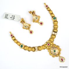 Vintage 22K Yellow Gold Choker Necklace with Earrings. Made of 22K Solid Gold and Set with Gemstones. Weight-26.050 Grams, Length-17 cm, Width-5.5 cm. Earrings-3.8 cm Gold Dual-tone Kundan Necklace For Wedding, Gold Temple Necklace For Anniversary And Festive Occasions, Gold Kundan Necklace With Meenakari For Anniversary, Traditional Gold Temple Necklace For Anniversary, 22k Gold Dual-tone Jewelry For Wedding, Dual-tone Gold Jewelry For Anniversary, Dual-tone 22k Gold Necklace For Weddings, Dual-tone 22k Gold Wedding Jewelry, Yellow 22k Gold Jewelry For Wedding