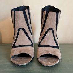 Tan Suede And Black Elastic Balenciaga Peep Toe Booties With 4.5” Heel. No Damage To Material, One Light Black Stain On Left Heel. High But Very Comfortable On The Feet. Size 38.5, Fits Someone Who Wears Us Size 7-7.5. Stretchy Material Is Forgiving On Sizing. Does Not Come With Original Box. Designer High Heel Boots For Spring, Formal Suede Open Toe Boots, Formal Open Toe Suede Boots, Designer Boots With Sculpted Heel For Spring, Open Toe Boots With Sculpted Heel For Spring, Spring Open Toe Boots With Sculpted Heel, Designer Suede Heels For Spring, Open Toe Suede Boots With Reinforced Heel, Designer Open Toe Boots With Reinforced Heel