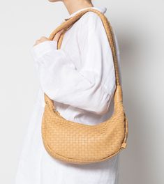 Dylan Woven Handbag | Tan Totes Cleobella On-the-go Natural Hobo Shoulder Bag, On-the-go Woven Leather Pouch Shoulder Bag, Versatile Natural Shoulder Bag For Everyday, Versatile Natural Color Hobo Bag For Everyday Use, Versatile Woven Leather Shoulder Bag For Everyday Use, Natural Hobo Bag With Removable Pouch For Everyday, Everyday Shoulder Bag With Braided Handles And Pouch Shape, Everyday Woven Leather Top Handle Bag, Versatile Woven Leather Bag