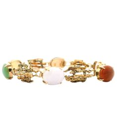 This pre-loved "bark" link Jade "Scarab" bracelet showcases a stunning array of five oval jadeite multicolor stones and one black nephrite jade stone. A unique 14kt yellow gold piece perfect for adding a touch of sophistication and color to any outfit. Scarab Bracelet, Wedding Bracelets, Nephrite Jade, Wedding Jewelry Bracelets, Gold Piece, Jade Stone, Wedding Bracelet, Vintage Gifts, Arm Band