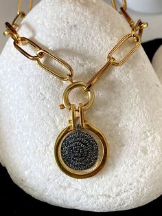 Buy an original Greek Pendant 22k Gold plated Phaistos Disk | Discover Greek Jewelry within a huge collection of Ancient Greek Jewelry | shipping worldwide This amazing piece of jewelry is representing the Ancient Greek Symbol so called Phaistos disc. An excellent gift for women and also for men that would love to wear a geometric symbol. Ideal present for someone who have already spent time in this beautiful island or he comes from this. Size The diameter of the big disc is 2.cm The thickness i Greek Silver Jewelry, Ancient Greek Symbols, Phaistos Disc, Ancient Greek Jewelry, Greek Symbol, Simple Chain Necklace, Geometric Symbols, Minimal Necklace, Greek Jewelry