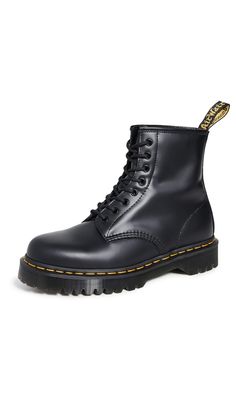 PRICES MAY VARY. Born on 1st April 1960 and named as such. Over six decades our 8-eye 1460 has become iconic. Dr. Martens classic Smooth leather Made with classic Doc's DNA, including grooved edges and visible stitching Built on the signature Dr. Martens air-cushioned sole, which is oil and fat resistant, with good abrasion and slip resistance Extra chunky, extra rugged Bex sole These iconic Dr. Martens boots are a cult favorite for all counter-culture lovers out there. Made with the durability Cargo Boots, Lollapalooza Outfit, Heel Combat Boots, Doc Martens Boots, Dr Martens Boots, Casual Heels, Dr. Martens Boots, Platform Boots, Lace Boots