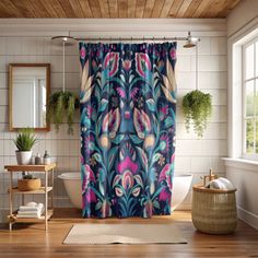 a colorful shower curtain in a bathroom