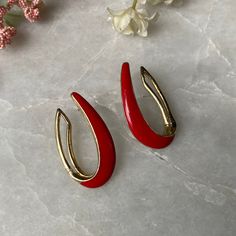 "Crown Trifari earrings Red enamel shaped like horseshoes Stamped inside rim * Has some discolorations on metal 1.5\" x 3/4\"" Elegant Horseshoe Earrings For Gift, Red Teardrop Hoop Earrings, Red Teardrop Hoop Earrings For Pierced Ears, Red Enamel Pierced Earrings, Red Pierced Enamel Earrings, Red Enamel Hoop Earrings For Gifts, Red Enamel Hoop Earrings Gift, Red Enamel Earrings, Red Pierced Hoop Earrings