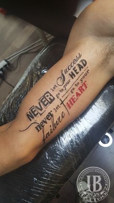 a person with a tattoo on their arm that says never, always, and never