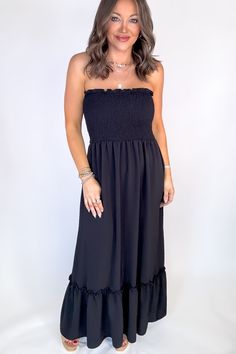 Be ready to shine in our Sunsational Maxi Dress! This flowy, strapless boho beauty will have you feeling effortlessly stylish at any occasion. Show off your shoulders in smocked detail and be the center of attention (in the best way!) Fit: She is wearing her true size medium. Fits true to size. If in between sizes, size down. Strapless Beach Tube Top With Smocked Back, Strapless Tube Top With Smocked Back For Beach, Strapless Smocked Bodice Tube Top For Beach, Casual Strapless Bandeau Dress With Smocked Back, Casual Bandeau Strapless Dress For Date Night, Casual Strapless Dress With Smocked Bodice For Day Out, Strapless Smocked Sundress, Bohemian Strapless Dress For Vacation, Casual Strapless Maxi Dress With Smocked Back