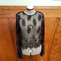 This Is A Gorgeous Long-Sleeved Black Lace Top, Perfect For Throwing Over A Summer Dress/Camisole. Features A Round Neck, Long Sleeves In A Beautiful Black Chantilly Lace. It Is Brand New With Tags. Black Lace Top With Sheer Long Sleeves, Black Fitted Long Sleeve Lace Top, Fitted Black Lace Top With Long Sleeves, Sheer Fitted Blouse For Fall, Black Fitted Lace Top With Sheer Sleeves, Fitted Black Lace Top With Sheer Sleeves, Fitted Sheer Blouse For Fall, Fitted Blouse With Sheer Sleeves For Night Out, Forever 21 Black Fitted Blouse