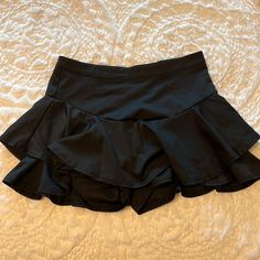 Skirt With Shorts Underneath/ Size L/ New/ Never Worn/ Smoke And Pet Free Home:) Skirts With Shorts Underneath, High Waist Ruffled Skort For Night Out, Night Out Lined Skirted Bottoms, High-waist Ruffled Skort For Night Out, Black Skirted Bottoms With Built-in Shorts, High Waist Skirt With Built-in Shorts For Night Out, High-waist Skirt With Built-in Shorts For Night Out, Casual Black Tiered Skirt Shorts, Casual Skirted Swim Skirt For Parties