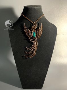 Blue Opalized Wood Pendant Carved Phoenix Bird with copper wire SIZE* Length            : 140 MM Wide               : 70 MM Thickness      : 13 MM WEIGHT         : 35 GR If you are still in doubt, please send a message directly to our store for more detailed information *IMPORTANT* PLEASE STATE YOUR CONTACT/ PHONE NUMBER IN THE "NOTES TO SELLER". WITHOUT PHONE WE ARE UNABLE TO SHIP YOUR ORDER. thank you very much from us INDONESIA MAJESTIC ARTWORK Opalized Wood, Wire Wrapped Stone Jewelry, Wire Wrap Jewelry Designs, Diy Jewelry Tutorials, Copper Wire Jewelry, Diy Jewelry Inspiration, Phoenix Bird, Wire Jewelry Designs, Wire Wrapping Stones