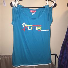 Teal Puma Tee Shirt With Cute White Tie Shoulders. Never Worn. Puma Logo Cotton Short Sleeve Top, Short Sleeve Cotton Top With Puma Logo, Cotton Short Sleeve Tops With Puma Logo, Casual Puma Logo Short Sleeve Top, Casual Short Sleeve Top With Puma Logo, Sporty Puma Logo Tops For Sports, Sporty Puma Tops For Sports, Puma Logo Cotton Tops For Athleisure, Athleisure Cotton Tops With Puma Logo