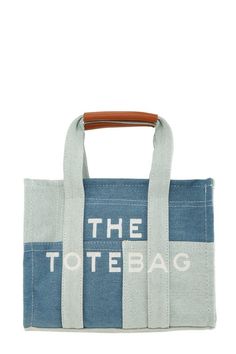 The Medium Denim Crossbody Tote Bag Casual Blue Canvas Bag For On-the-go, Blue Denim Bags With Double Handle, Blue Denim Tote Canvas Bag, Blue Denim Canvas Bag For Daily Use, Blue Denim Canvas Shoulder Bag, Blue Denim Shoulder Canvas Bag, Blue Denim Shoulder Bag, Trendy Blue Canvas Travel Bag, Daily Blue Denim Canvas Bag