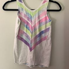 Cute Tank With Split Back. Pastel Design On Front. Brand New. Playful Stretch Tank Top For Spring, Multicolor Sleeveless Gym Tops, Sporty Summer Tops For Playwear, Multicolor Graphic Print Tops For Playwear, Multicolor Sleeveless Sports Top, Multicolor Graphic Print Athleisure Top, Multicolor Athleisure Tops For Gym, Multicolor Athleisure Tops For The Gym, Playful Multicolor Activewear For Workout