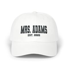 Celebrate the special moment with this Personalized Bride Embroidered Hat, custom-made to include the bride's name and wedding date or "Mrs. Est." This classic baseball cap is the perfect gift for the bride-to-be, whether for her bridal shower, wedding day, or honeymoon. Crafted with high-quality cotton and featuring beautiful embroidery, this cap is both stylish and meaningful--an essential accessory for any new bride! The hat can be fully personalized with the bride's name and special details, Bride Embroidery, Embroidery Hat, Honeymoon Gift, New Bride, Bride Hat, Honeymoon Gifts, Brand Stickers, Hat Custom, Personalized Bride