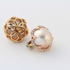 These lovely and charming pearl earrings make a wonderful gift, for yourself or your loved one. The heavenly pearl matches perfectly with the flawless 18k gold and brilliant sparkling diamonds. Like the smooth, gentle notes of a lilting sonata, these earrings are sure to draw you in. Luxury Brilliant Cut Pearl Earrings For Evening, Luxury Pearl Earrings With Diamond Accents, Elegant Formal Clip-on Diamond Earrings, Luxury Pearl Earrings With Diamond Accents For Evening, Luxury Brilliant Cut Pearl Earrings For Formal Occasions, Luxury White Gold Clip-on Pearl Earrings, Elegant Yellow Gold Clip-on Diamond Earrings, Elegant Diamond Clip-on Earrings, Luxury Yellow Gold Diamond Pearl Earrings