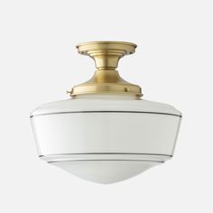 a white and gold light fixture