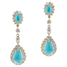 Turquoise Cabochon and Diamond Dangling Earrings made in 18k Yellow Gold. The diamonds estimated weight 2.25 carats, H-I color, VS-SI clarity. The length is 1 3/4 inches. SKU: 1492-BTYJEJRT Diamond Dangling Earrings, Tanzanite Diamond, Diamond Dangle Earrings, Dangling Earrings, Silver Earrings Dangle, Cultured Pearls, Turquoise Stone, Gold Beads, Vintage Earrings