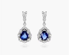 14K White Gold Teardrop Sapphire and Diamond Earring. Modern elegance meets timelessness with these brilliant earrings. Wear them to create a look of irresistible glamour. Timeless Pear-shaped Diamond Earrings For Formal Occasions, Timeless Fine Jewelry Diamond Earrings For Formal Occasions, Formal Fine Jewelry Diamond Earrings With Timeless Design, Elegant Earrings With Timeless Design, Formal Timeless Diamond Earrings, Classic Teardrop Diamond Earrings For Evening, Timeless Teardrop Diamond Earrings For Evening, Elegant Diamond Earrings With Timeless Design, Luxury Pear-shaped Teardrop Earrings For Formal Occasions