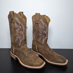 These Justin Boots In Tan Are A Must-Have For Any Cowboy Or Cowgirl Enthusiast. With A Square Toe And Low Heel, They Provide Both Comfort And Style. Made Of High-Quality Leather, These Boots Are Sure To Last For Years To Come. The Mid-Calf Shaft Style And Western Theme Make Them Perfect For Any Occasion. Whether You're On The Ranch Or In The City, These Boots Will Have You Looking And Feeling Great. Available In Size 7.5, They Are A Great Addition To Any Women's Shoe Collection. Western-style Work Boots With Rubber Sole, Western Work Boots With Leather Sole And Round Toe, Western Style Boots With Cushioned Footbed, Leather Boots With Ortholite Insole And Round Toe, Western Style Closed Toe Boots With Cushioned Footbed, Western Style Cushioned Closed Toe Boots, Casual Fitted Work Boots With Snip Toe, Casual Fitted Snip Toe Work Boots, Western Boots With Rubber Sole And Round Toe