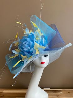 Blue Fitted Fascinator For Beach, Blue Mini Hats For Spring Beach Occasions, Blue Mini Hats For Summer Beach, Blue Short Brim Fascinator For Summer, Blue Fascinator With Short Brim For Summer, Blue Mini Hat With Short Brim For Spring, Blue Mini Hats With Short Brim For Spring, Blue Summer Fascinator Hat, Summer Blue Fascinator With Short Brim