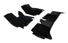 three black floor mats for the front and rear seats