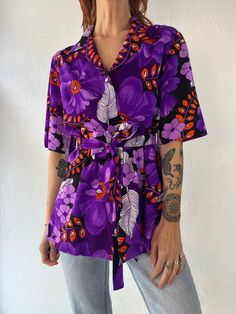 "- Vintage 1970s purple floral print blouse - No size or fabric content tags - Sash belt - Feels like poly - Large Chest: 22\" Length: 28\" Sleeve: 12\"" Vintage Purple Top With Floral Print, Vintage Purple Floral Print Top, Purple Vintage Floral Print Tops, Purple Floral Print, Womens Blouses, Sash Belt, Striped Midi Dress, Pink Gingham, Peasant Dress