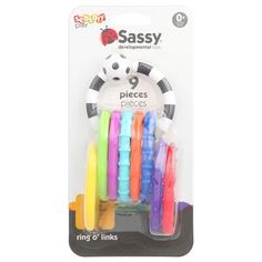 six assorted colored plastic toothbrushes in packaging