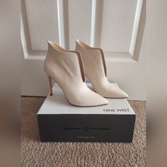 Stunning Ivory Leather Ankle Boots By Nine West. New, Size 9. Heel 4 Inches. Chic Beige Pointed Toe Booties, Formal Cream Ankle Boots, Cream High Heel Leather Booties, Chic Cream Booties With Almond Toe, Cream High Ankle Heels Medium Width, Cream High Ankle Heels, Chic Cream Almond Toe Booties, Cream Pointed Toe Booties Medium Width, Cream High Ankle Leather Booties