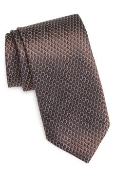 Subtle patterning brings understated distinction to a tie that's crafted from Italian silk jacquard and styled to complement any formal or semiformal look. 100% silk Spot clean Made in Italy Elegant Patterned Ties For Formal Occasions, Elegant Formal Patterned Ties, Elegant Tailored Brown Suit And Tie Accessories, Elegant Brown Suit And Tie Accessories For Office, Elegant Brown Suit And Tie Accessories For Semi-formal Occasions, Elegant Brown Tie For Semi-formal Events, Silk Ties For Work, Elegant Patterned Ties For Semi-formal Occasions, Elegant Formal Brown Suit And Tie Accessories