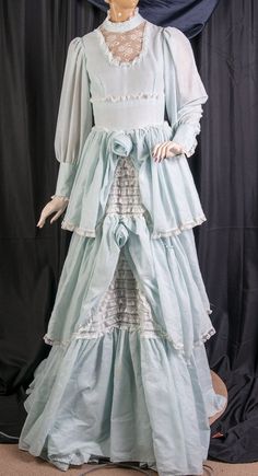 Blue Vintage Victorian Dress With Ruffles, Victorian Prairie Wedding Dress With Ruffles, Victorian Prairie Dress With Ruffles For Wedding, Vintage Cotton Victorian Wedding Dress, Vintage Light Blue Ruffled Dress, Vintage Cotton Prairie Wedding Dress, Cottagecore Prairie Dress With Ruffles For Wedding, Light Blue Vintage Dress With Ruffles, Vintage Light Blue Dress With Ruffles