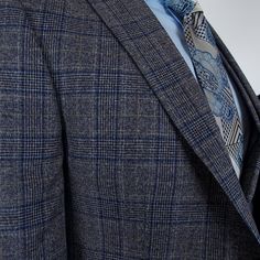 Men's suits are the ultimate in formal wear, designed to make a statement of sophistication and style. Whether you prefer a classic or slim fit, a tailored or bespoke suit, there's a perfect suit for every occasion. With single-breasted or double-breasted styles, notch or peak lapels, and solid colors or checkered and herringbone patterns, you can create a suit that's uniquely yours. For the most formal occasions, a tuxedo or dinner jacket will make you stand out from the crowd. And for a three- Semi-formal Notch Lapel Tweed Jacket, Semi-formal Dapper Suits, Fitted Timeless Sport Coat For Semi-formal Occasions, Dapper Formal Suits With Welt Pockets, Dapper Suits With Welt Pockets For Formal Occasions, Dapper Single-breasted Three-piece Suit For Semi-formal Occasions, Dapper Single-breasted Three-piece Suit For Semi-formal, Fitted Blazer With Pocket Square And Suit Collar, Business Casual Custom Fit Suits