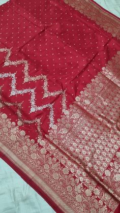 Drape six yards of pure elegance. This Bnarasi Buti  saree is a perfect festive wear.  Occasion: Partywear/Casual wear Material: pure silk Fabric: jamawar brocade Pattern: Floral/paisley/buti, motifs Border: yes Border type: zari Zari Type: golden zari Length: 6.5mtr. Blouse: Yes  Quantity :( 5 pcs.)You Can take in five different colors. Pink Bollywood Pre-draped Saree With Meenakari, Paithani Silk Saree With Motifs, Anarkali Paithani Silk Saree With Motifs, Pink Meenakari Lehenga For Puja, Pink Banarasi Silk Unstitched Suit For Navratri, Pink Katan Silk Traditional Wear, Traditional Dola Silk Shawl With Pallu, Traditional Pink Unstitched Suit With Pallu, Navratri Pink Banarasi Silk Unstitched Suit