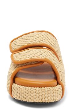 Woven raffia wraps the dual straps and chunky platform of this adjustable hook-and-loop slide sandal with naturally breathable leather lining. 2" heel; 1 1/2" platform (size 9US/39EU) Synthetic, textile and leather upper/leather lining/synthetic sole Made in Portugal Double Strap Wedge Sandals With Removable Insole For Beach, Beach Wedge Sandals With Double Strap And Removable Insole, Synthetic Slides With Heel Loop For Beach, Beach Slides With Heel Loop In Synthetic Material, Synthetic Double Strap Platform Slides, Casual Double Strap Mules For Beach, Double Strap Mules For Summer Beach, Casual Double Strap Mules With Removable Insole, Summer Slides With Heel Loop