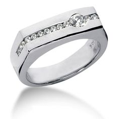 a white gold ring with three diamonds