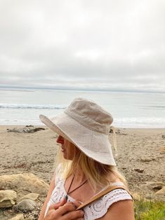 A sun hat for beach days and summer fun. Comfortable fit and breathable linen. This sun hat for women has a nice wide brim.. Easy to bring along in your bag, folds up easy. Shop at Bluecorduroy.etsy.com  #linenhat #womenshat #sunhat #beachhat #beachstyle #accessory #summerhat Lightweight Bucket Hat For Vacation Travel, Lightweight Bucket Hat For Travel And Vacation, Adjustable Brimmed Bucket Hat For Beach Season, Adjustable Casual Bucket Hat For Beach Season, Casual Adjustable Bucket Hat For Beach Season, Beige Summer Bucket Hat With Uv Protection, Wide Brim Casual Bucket Hat For Beach Season, Beachy Sun Hat With Uv Protection, Beige Bucket Hat With Upf 50+ For Travel