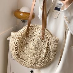 Bohemian Brown Bags For Beach Season, Bohemian Beige Bags With Open Weave, Round Shoulder Bag For Travel, Bohemian Brown Straw Bag With Large Capacity, Bohemian Beige Beach Bag With Large Capacity, Light Brown Bucket Straw Bag For The Beach, Trendy Light Brown Straw Beach Bag, Large Capacity Bohemian Crochet Bag, Cream Bohemian Shoulder Bag For Beach Season