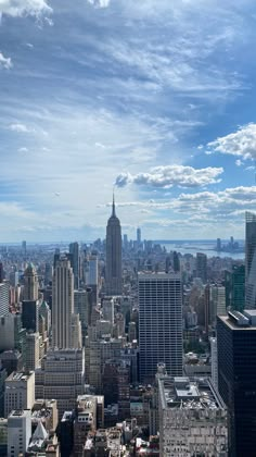 an aerial view of new york city from the top of the empire building in midtown