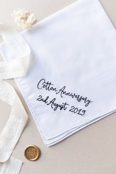 Our luxury men's cotton handkerchief, embroidered with Cotton Anniversary and personalised with your wedding date Handkerchief is presented in lovely gift box, with gift tag - ready to give straight to the special man in your life. Made from 100% cotton, our embroidered handkerchief would make a lovely gift for your husband on your anniversary! ● 100% White Cotton Handkerchief ● Embroidered in Nottingham  ● Choice of 32 embroidery colours ● Embroidered diagonal in the corner ● Hankie gift box is Wedding Embroidery Gifts, Second Wedding Anniversary Gift, Cotton Anniversary Gifts For Him, Handkerchief Embroidered, Second Wedding Anniversary, Second Wedding, Cotton Anniversary Gifts, Wedding Embroidery, Embroidered Handkerchief