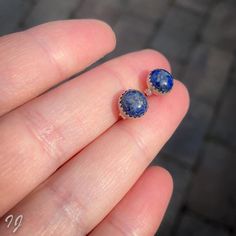 Handmade sterling silver stud earings with a beautiful 8mm lapis lazuli cabochon set in a serrated bezel. Choose between an oxidized or bright silver for a unique look. Take a look at my other earrings: https://www.etsy.com/shop/IngeJewels?ref=hdr_shop_menu&section_id=15129165 Please read my policies before buying. Blue Round Stone Earrings For Gift, Blue Cabochon Sterling Silver Earrings, Silver Round Lapis Lazuli Earrings, Silver Lapis Lazuli Round Earrings, Royal Blue Sterling Silver Jewelry, Blue Bezel Set Earrings For Gift, Blue Cabochon Sterling Silver Jewelry, Blue Sterling Silver Cabochon Jewelry, Sterling Silver Blue Cabochon Jewelry